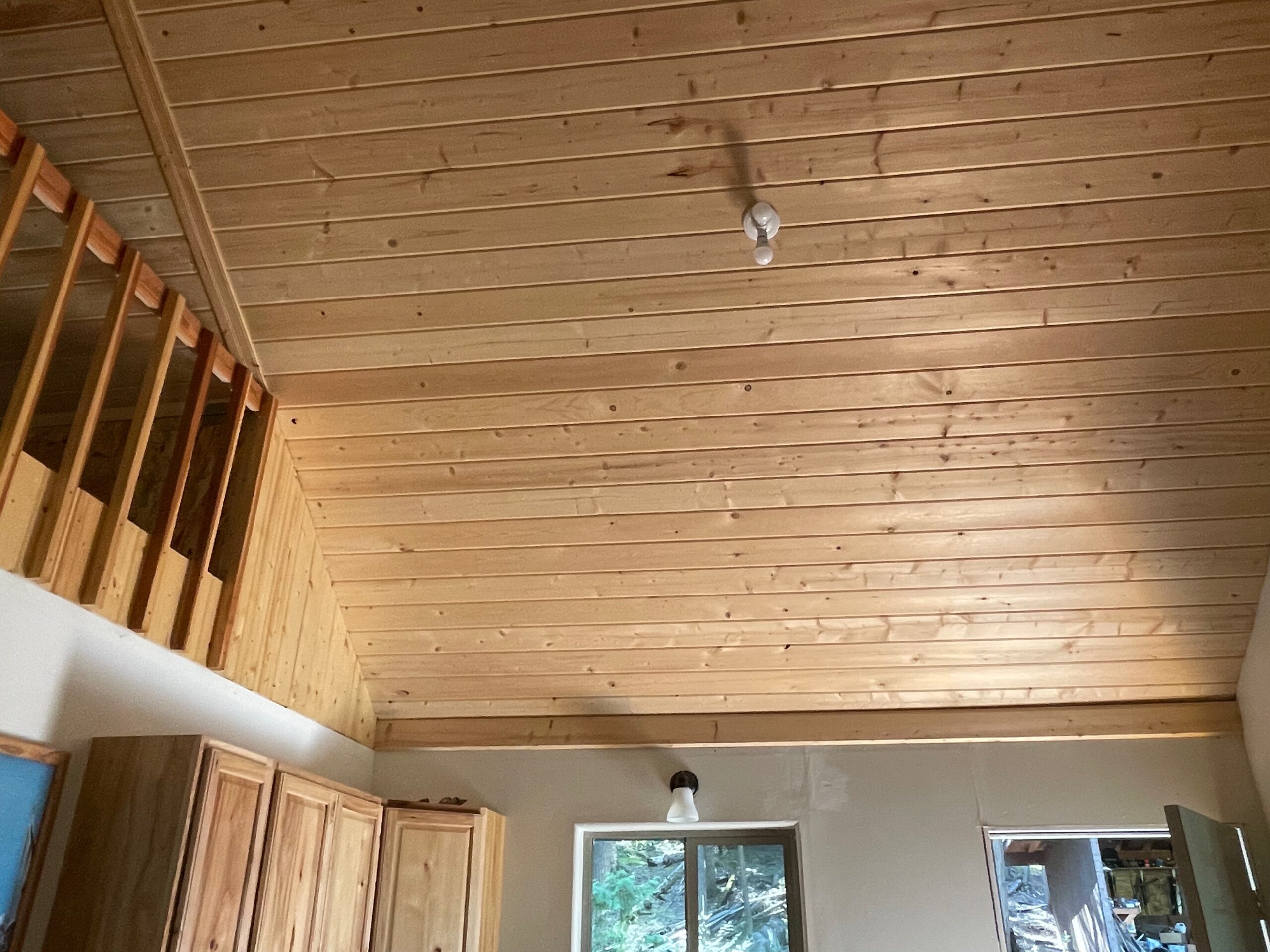 The cabin has beautiful tongue-n-groove ceilings. 