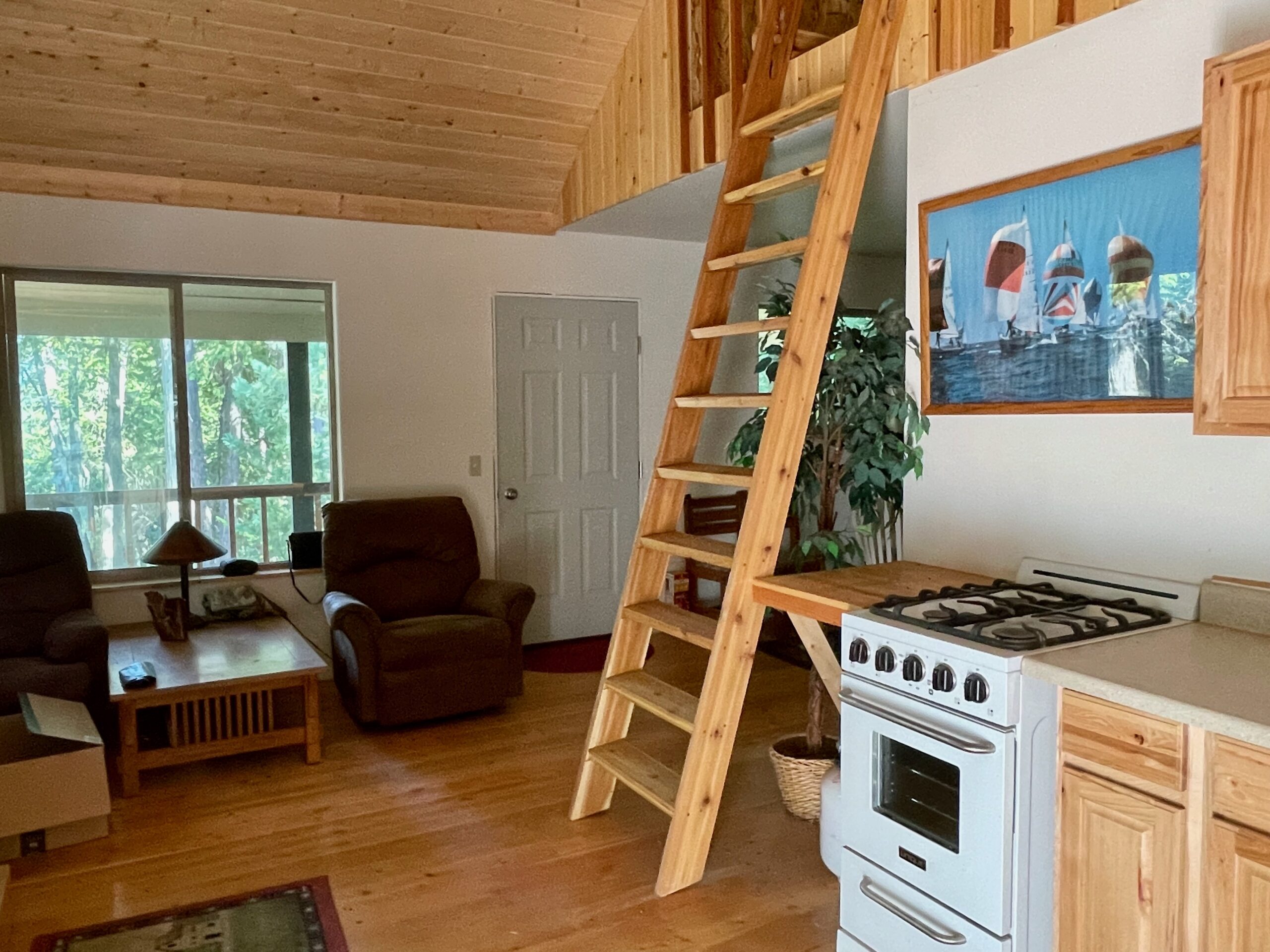 A close-up of the sturdy ladder to the loft which slides in and out for ease of access to the loft and to create more living space.