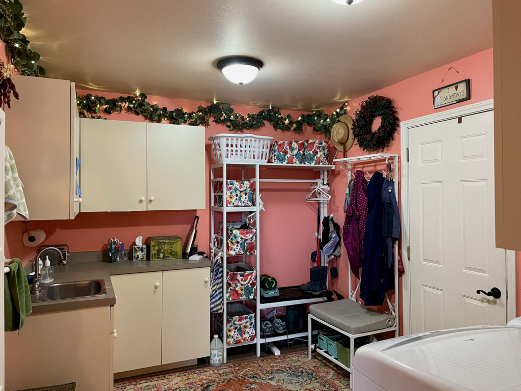 Laundry/mudroom with sink and access to and from the garage.