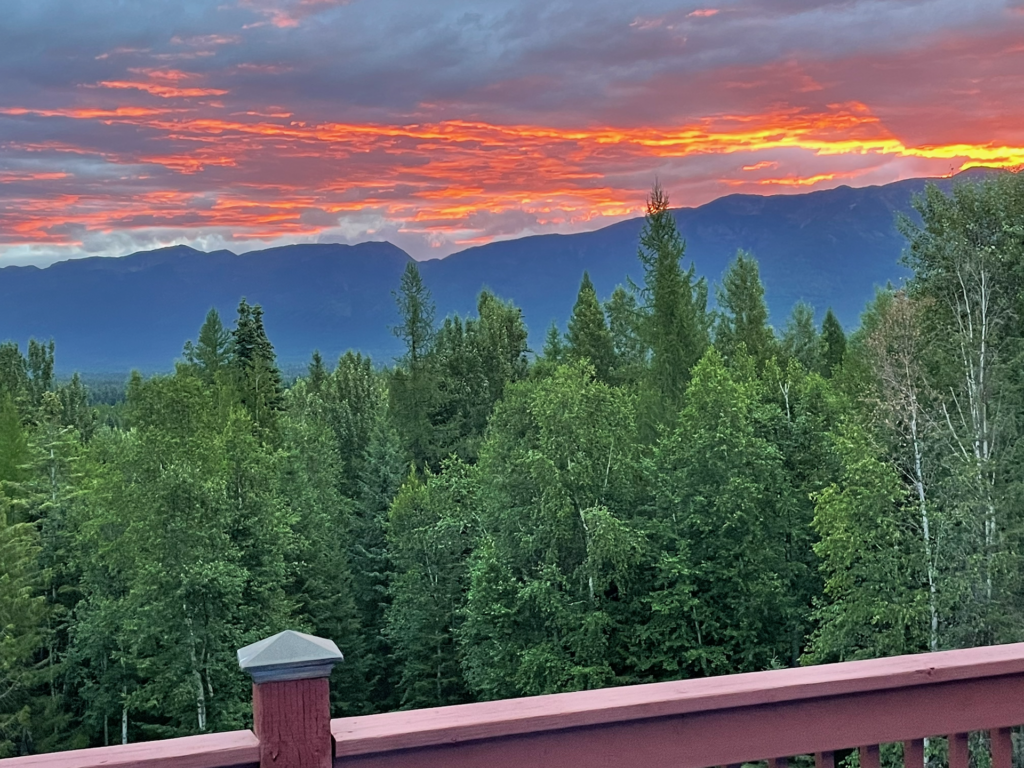 A bright orange and purple sunset over the Swan Range.