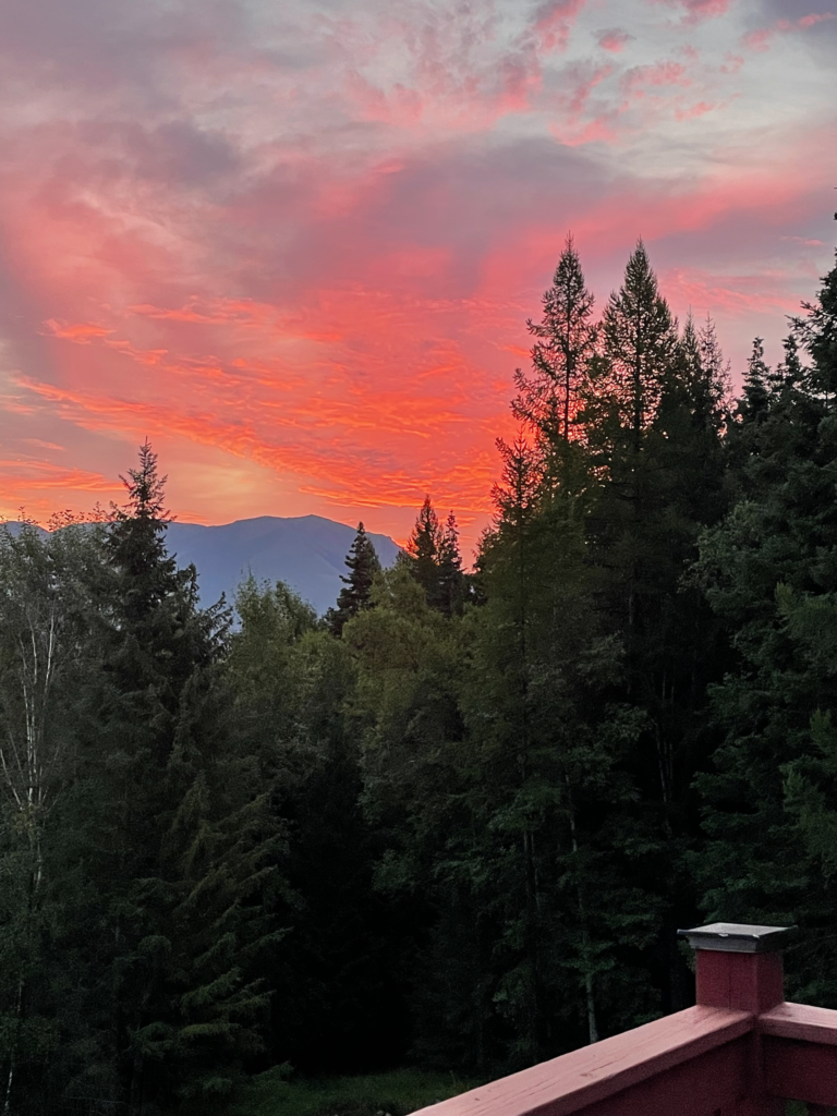 An amazingly bright red-orange sunset over the Swan Range.