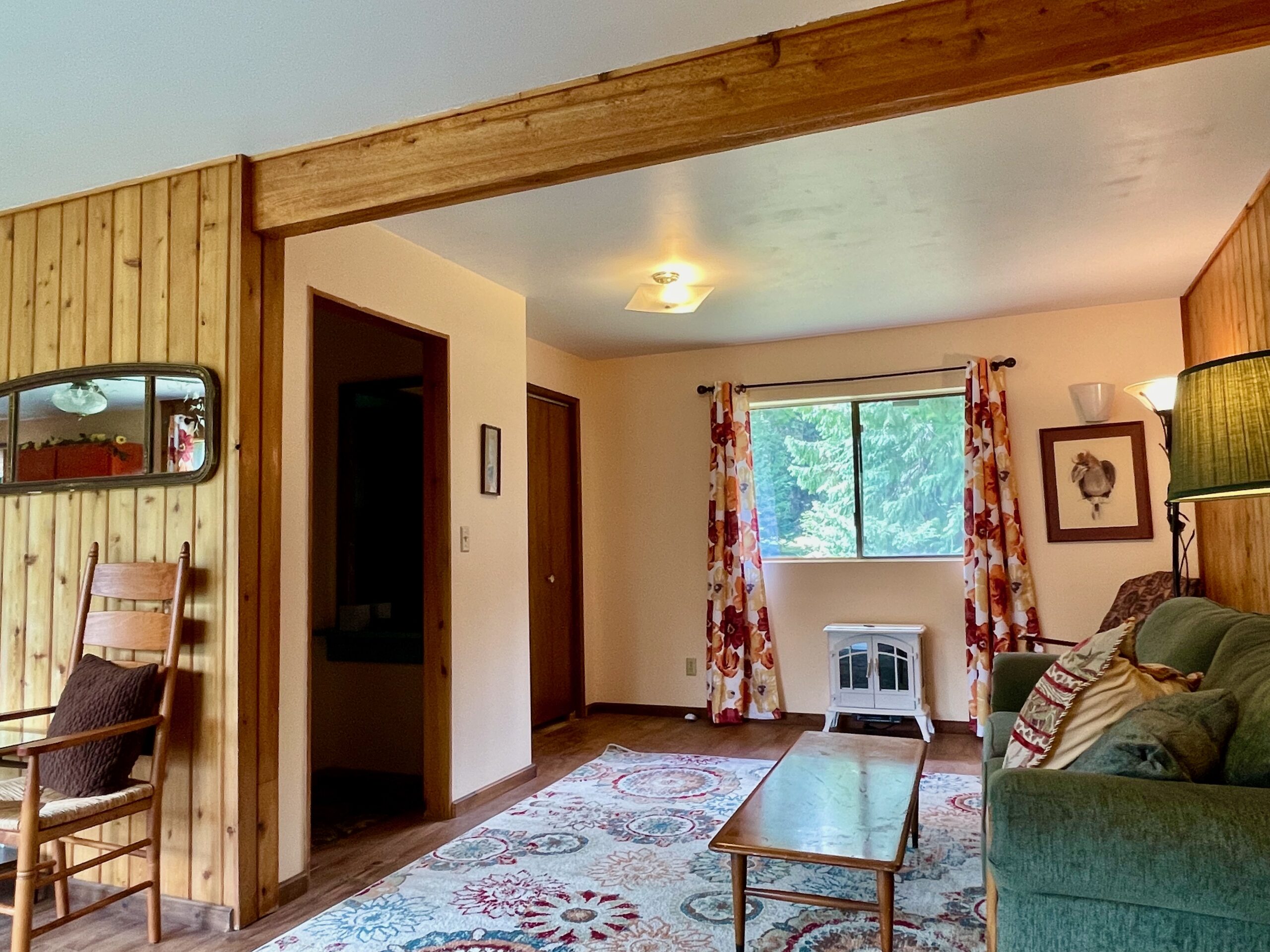 On the left side there is a closet and a hallway into the bathroom.